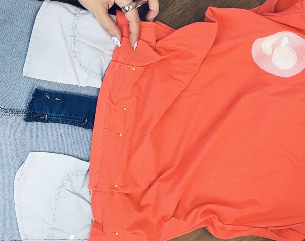 kam snap attached to shoulder opening on DIY adaptive clothing