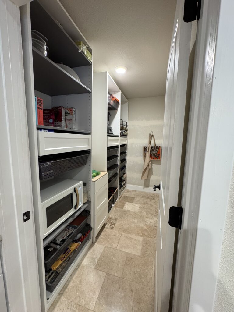Image of an Ikea pantry setup with pax frames being used as a kitchen pantry