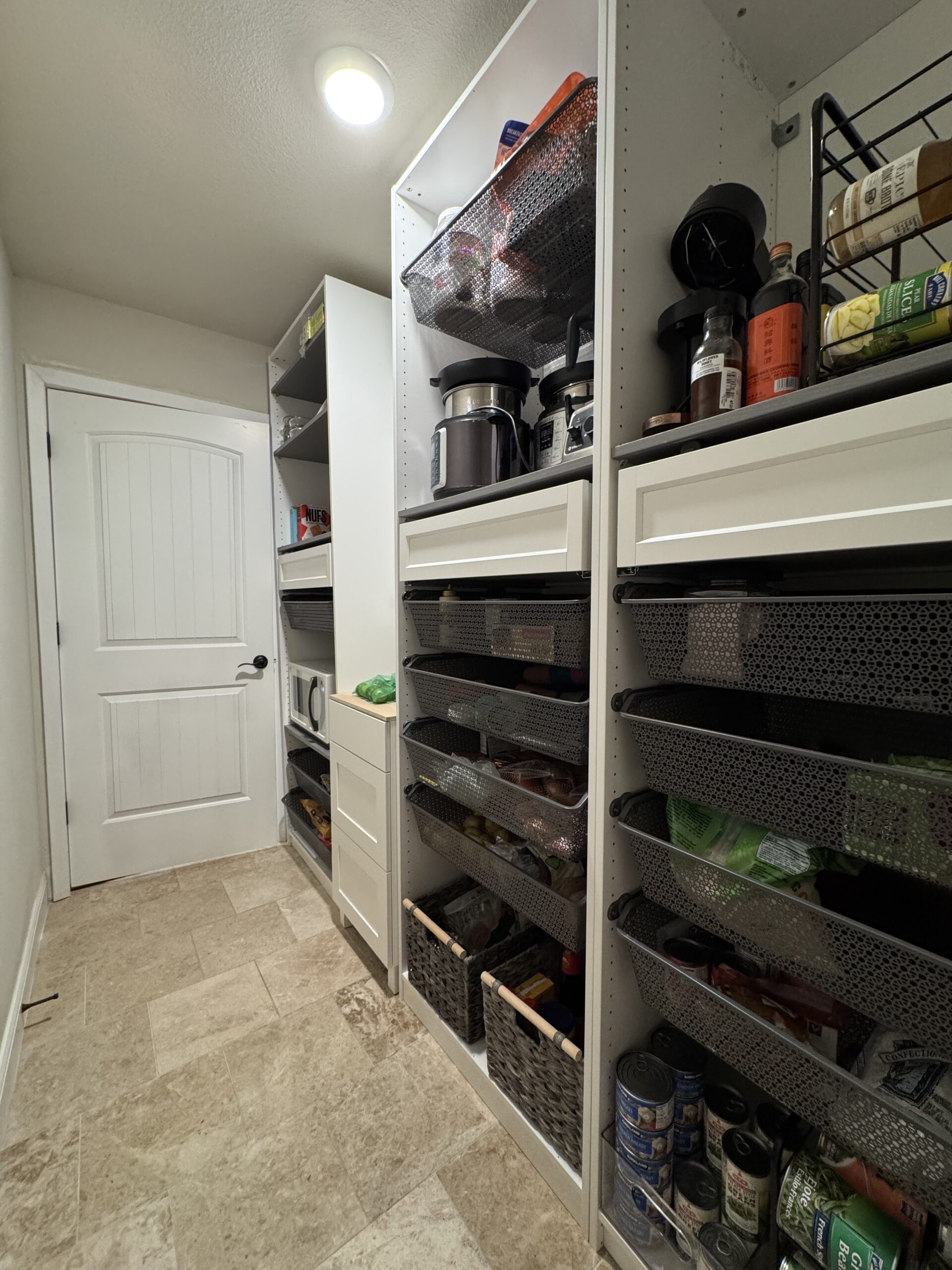 Ikea wardrobe used for a pantry in the kitchen