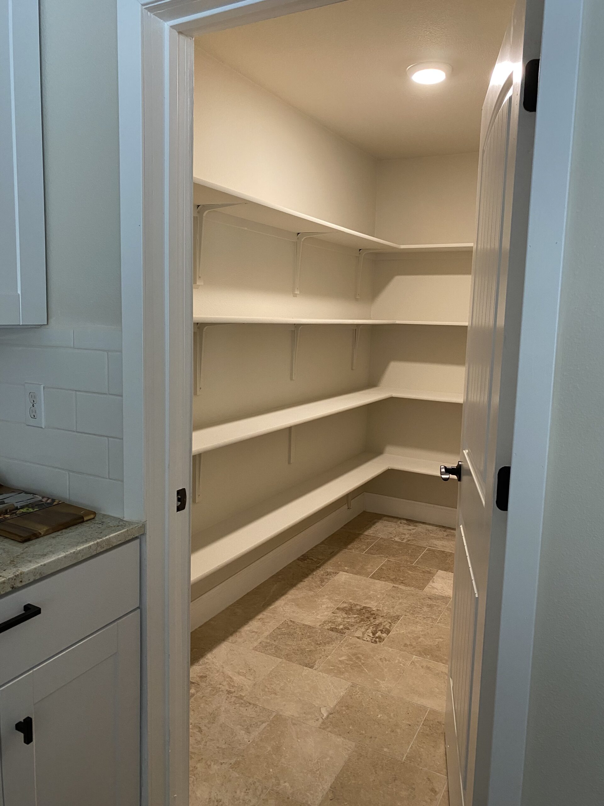 Interior of a builder grade pantry