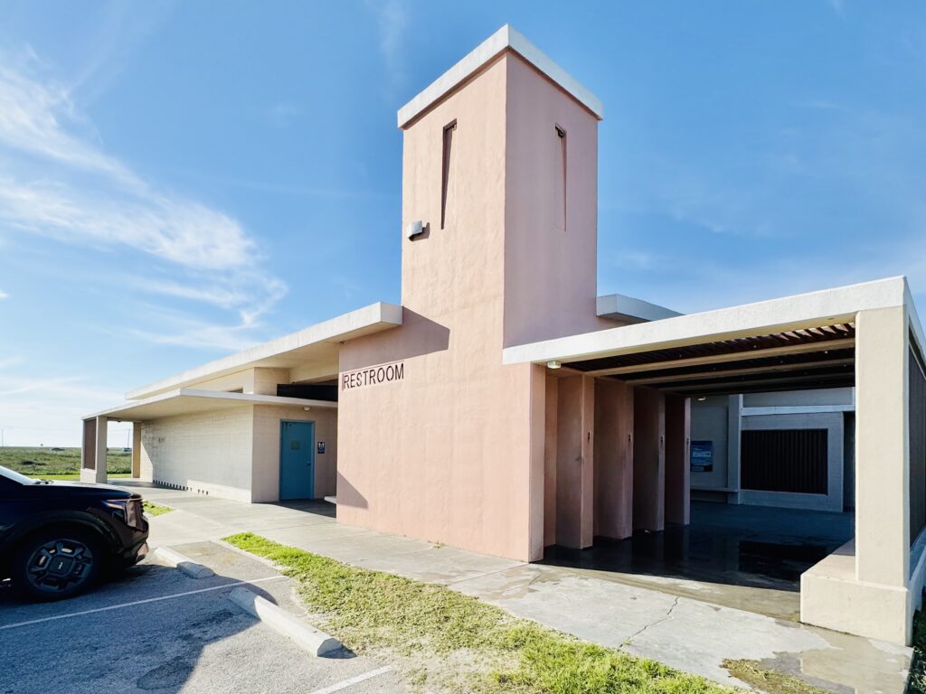 Mustang Island State Park shower and restroom facility exterior showing men's women's and family restroom access