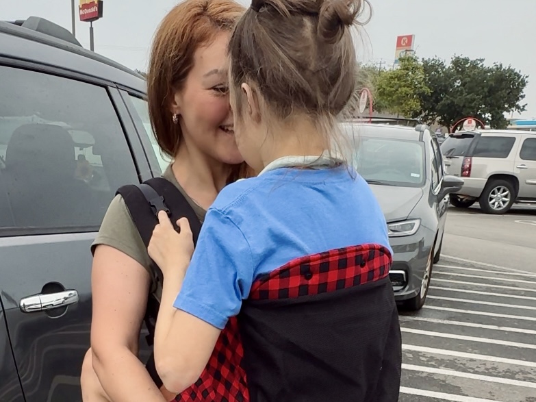 baby carriers for disabled teens- real life example, using Kinderpack child size carrier for bigger kids