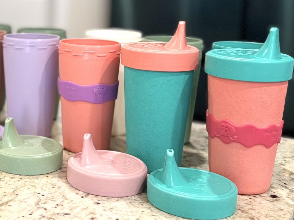 Sippy cups with orbits labels by inch bug brand to allow blind teenager to  tell the difference 