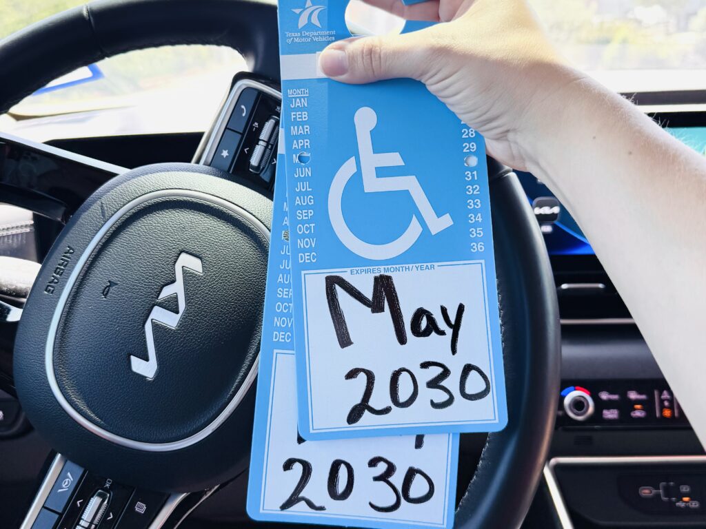 handicap placard Texas issued for child held inside vehicle